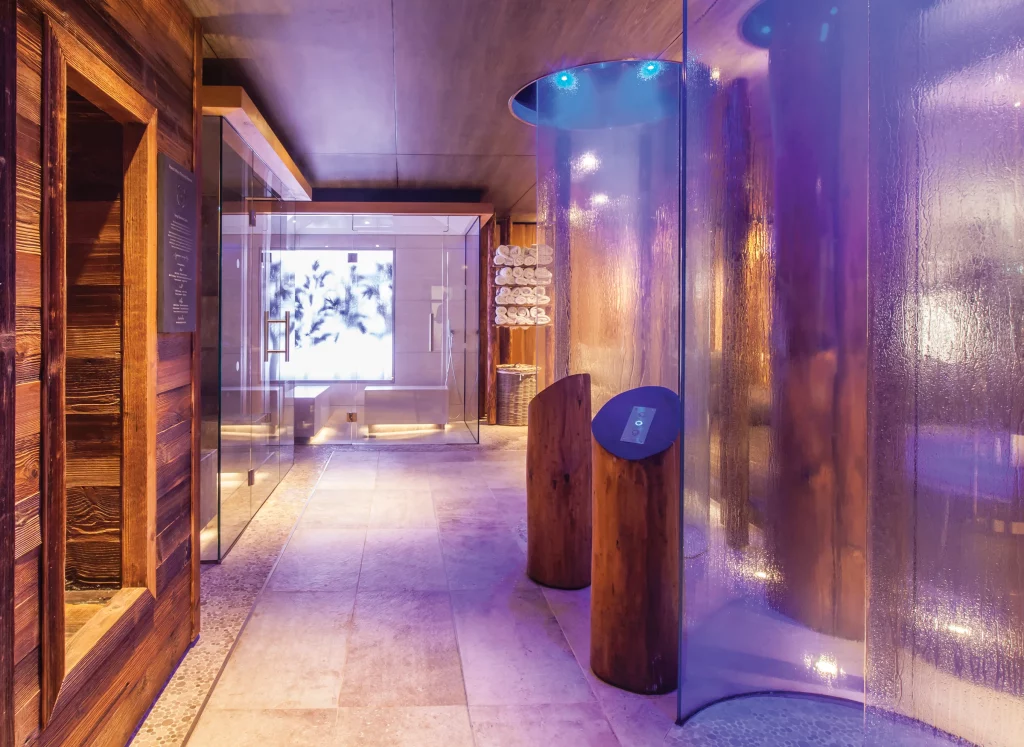 Spa circulation space shaped through spa design consultancy, using natural materials, light and sensory transitions