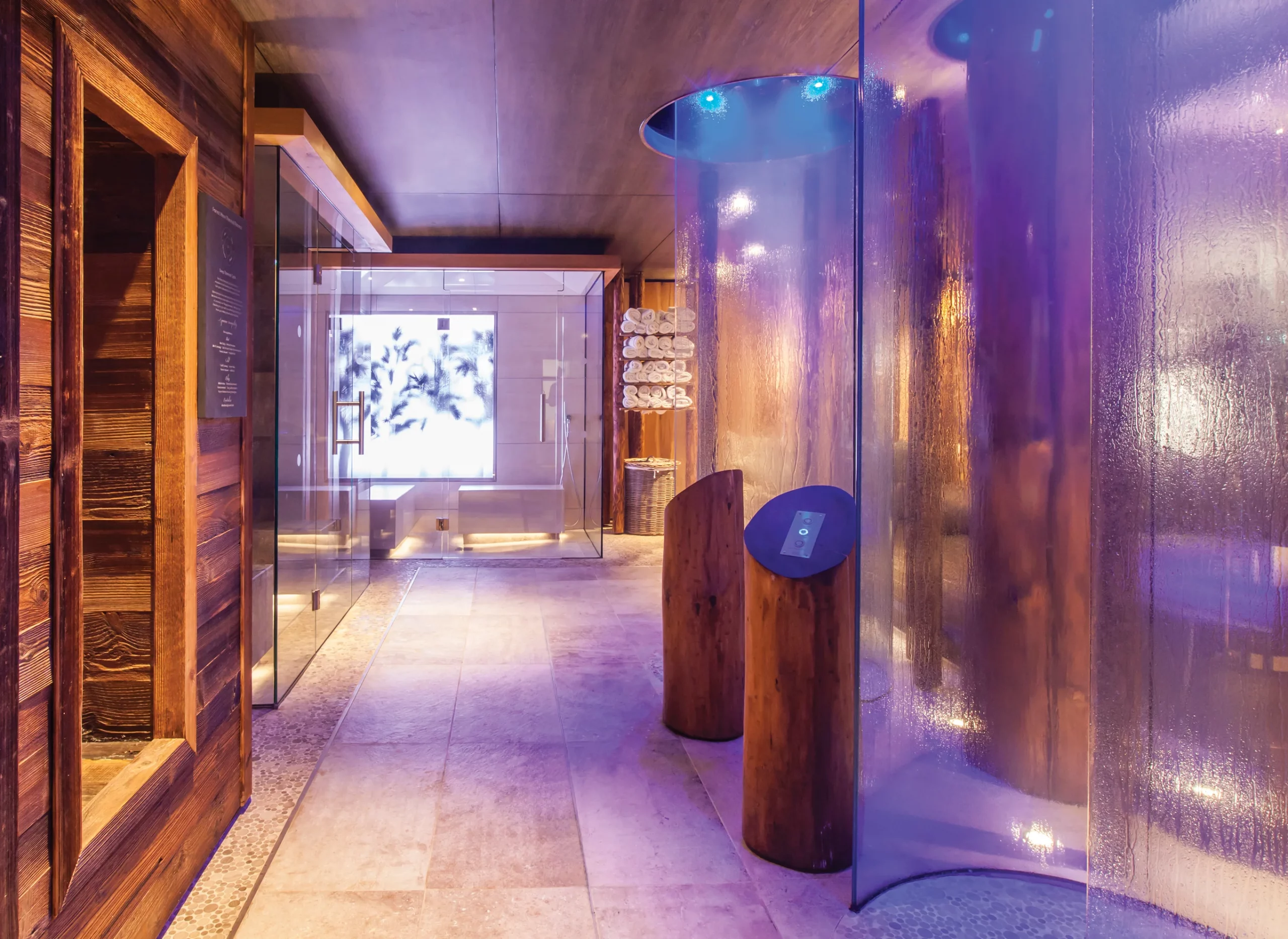 Spa circulation space shaped through spa design consultancy, using natural materials, light and sensory transitions